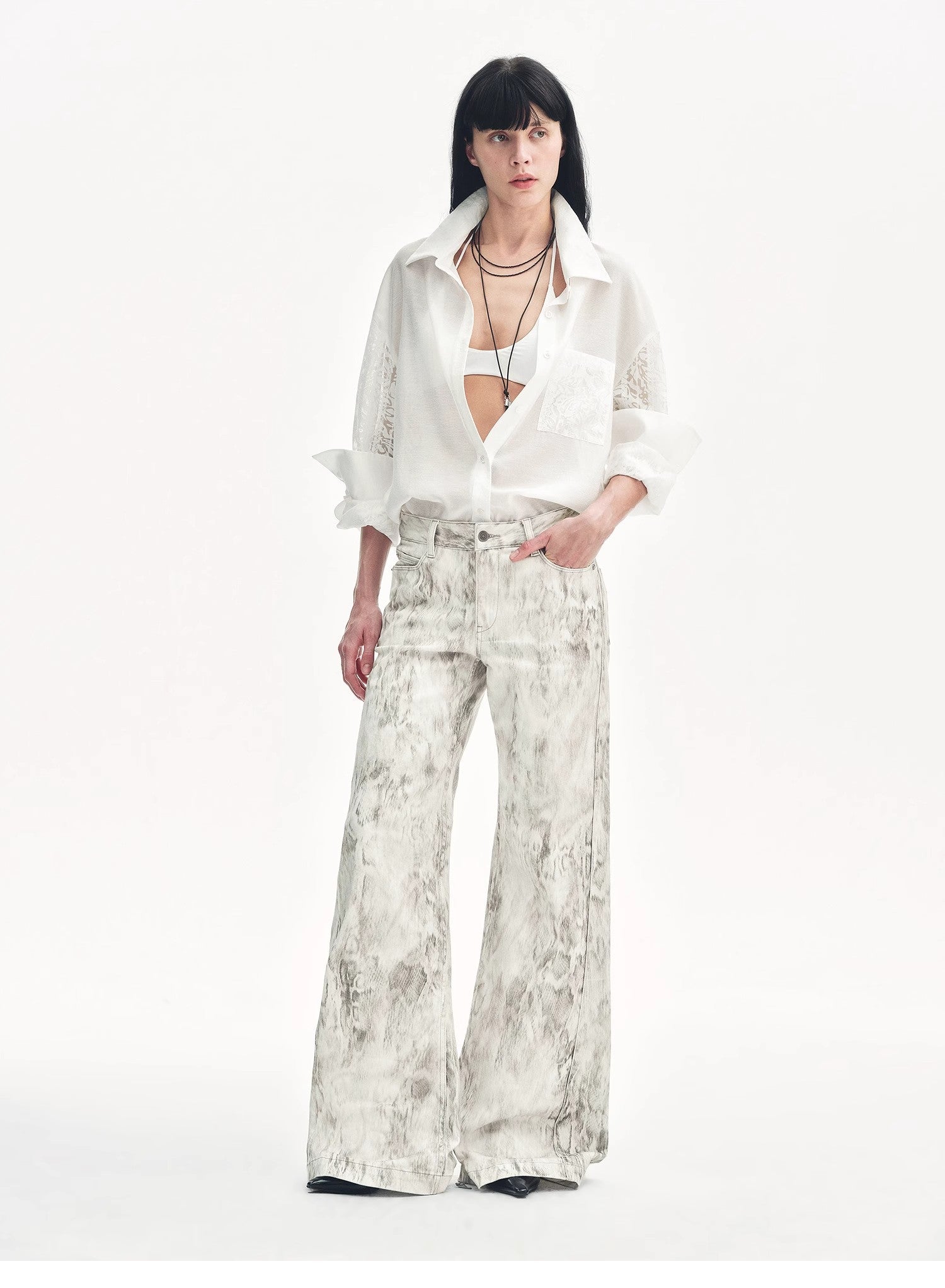 "Phantom" original snake print flared denim trousers