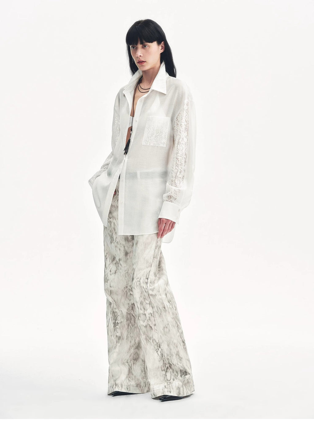 "Phantom" original snake print flared denim trousers